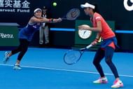 BEIJING, CHINA - OCTOBER 08:  Hao-Ching Chan and Yung-Jan Chan of Chinese Taipei return a shot against Caroline Garcia and Kristina Mladenovic of France during the Women's Double Semi Final match on day eight of the 2016 China Open at the China National Tennis Centre on October 8, 2016 in Beijing, China.  (Photo by Etienne Oliveau/Getty Images)